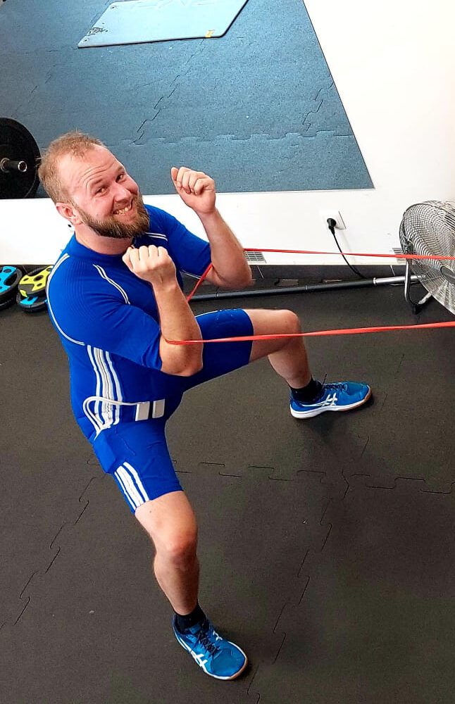 Piotr Wrona in ems suit